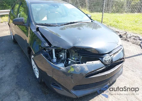 2018 Toyota Corolla Le z USA, uszkodzony, nr VIN 5YFBURHEXJP828369